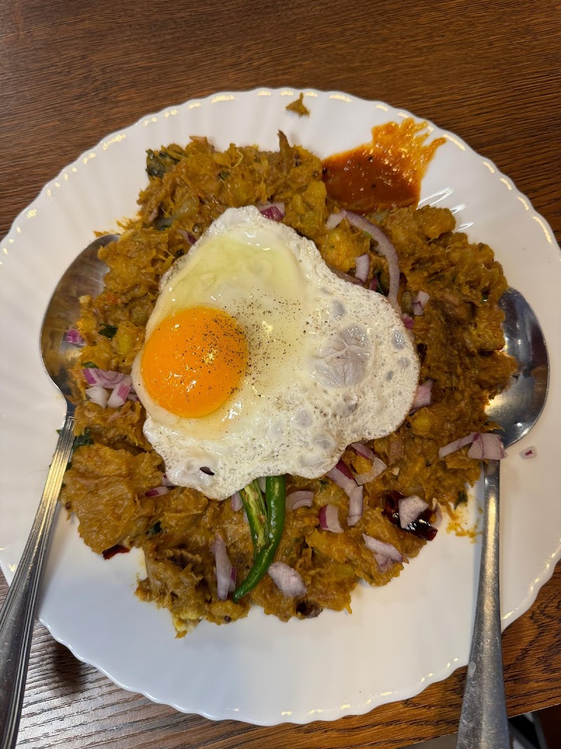 Kappa biriyani topped with a fried egg