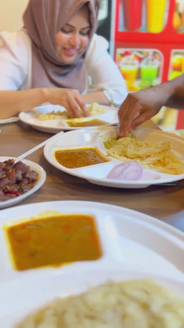 Porotta with curry and beef fry at Mumkin